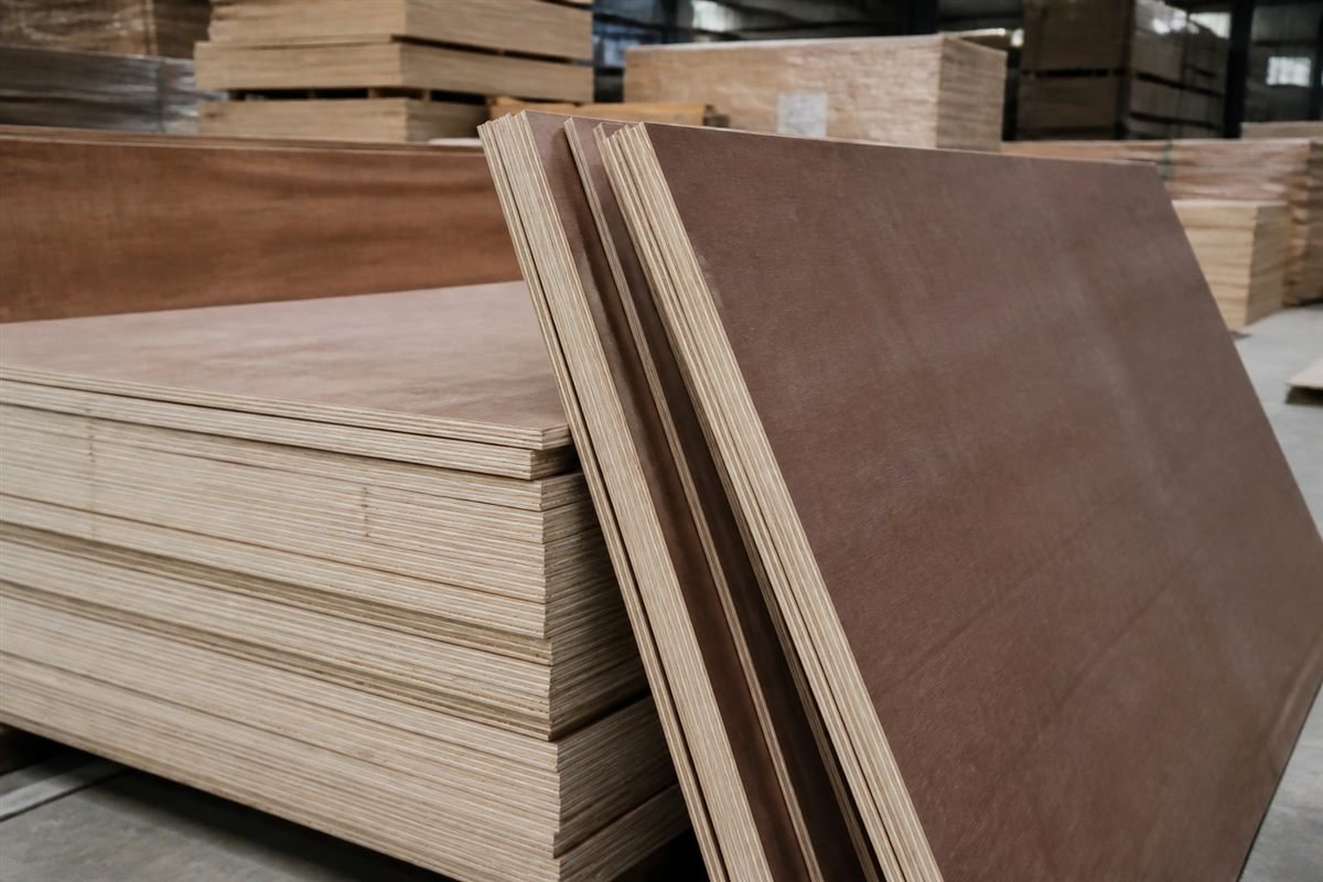 Stacked plywood sheets in warehouse